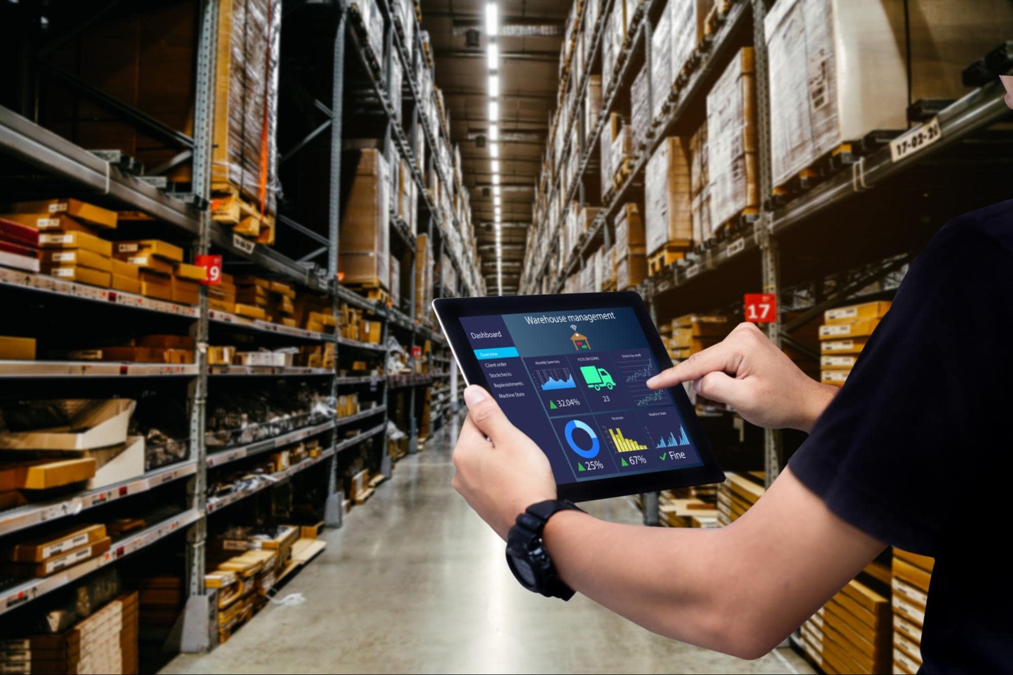A warehouse manager using an iPad to track logistics.
