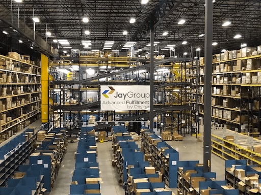 The Jay Group fulfillment facility floor. Packages line the shelves.